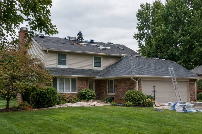 Close view of architectural asphalt shingles on a roof